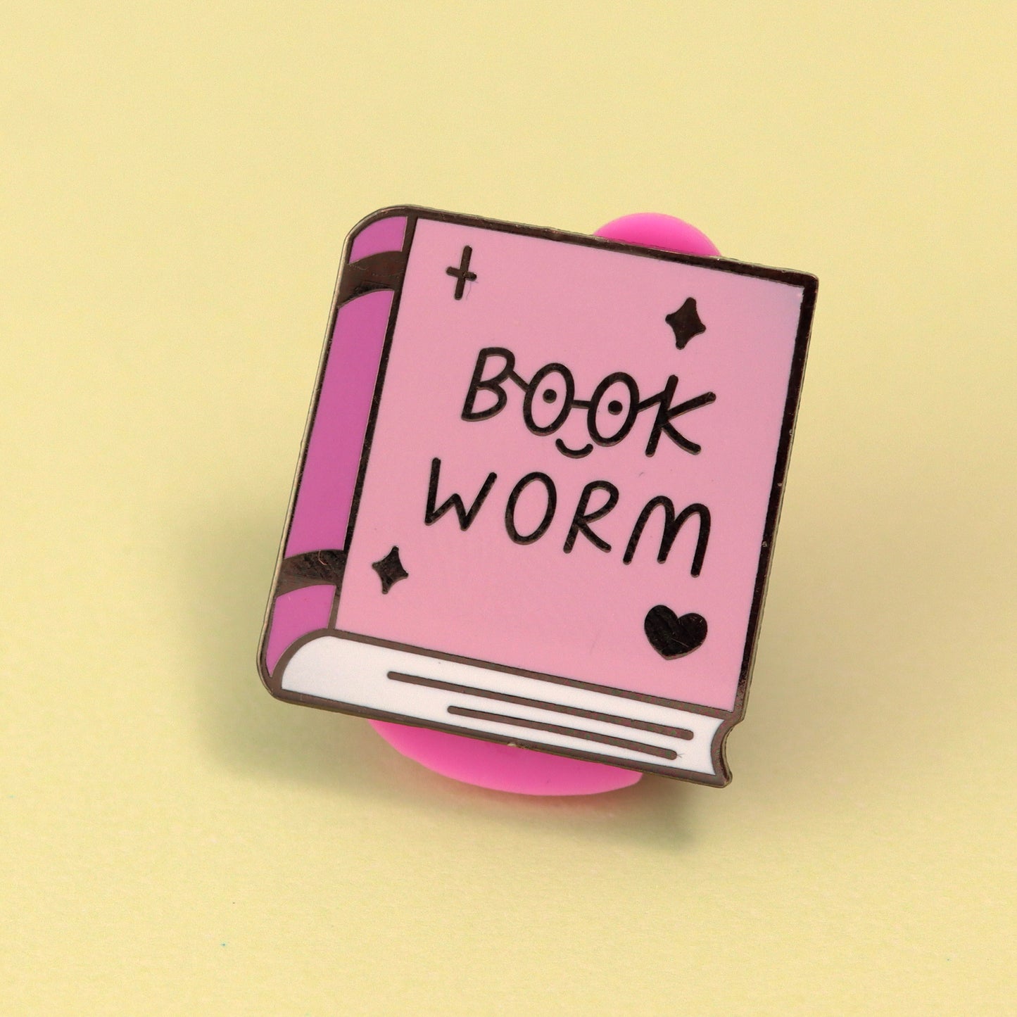 Bookworm reading enamel pin