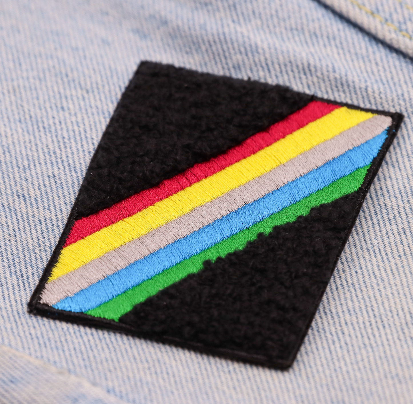 Disability pride flag enamel pin
